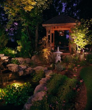 Japanese-inspired garden area at night