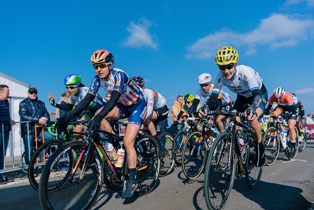Megan Guarnier and Emma Johansson lead the chasing peloton over the VAMberg for the second time at Ronde van Drenthe
