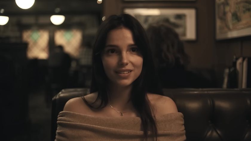 Nikki telling Bear she loves him in a restaurant. 