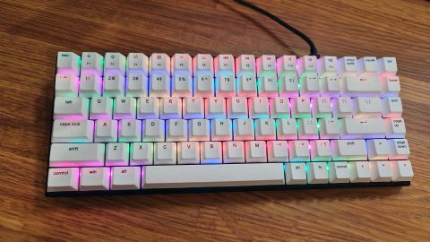 Vissles V84 gaming keyboard on a desk with RGB enabled