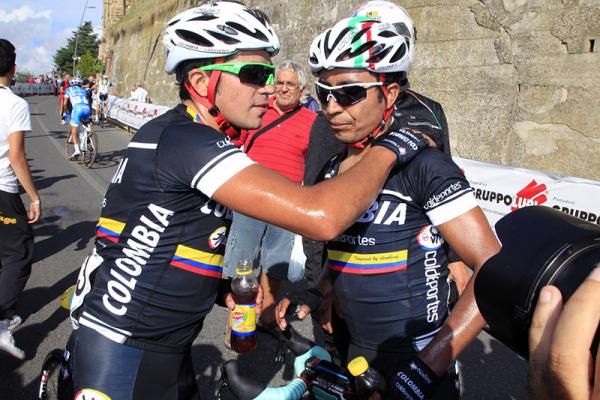Fabio Duarte (L) celebrates his victory with a Colombia-Coldeportes teammate.