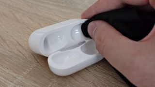 How to clean an AirPods case: Clean inside of case with folded dry cloth