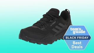 Adidas Terrex AX4 hiking shoe in black with Tom's Guide Black Friday deal bottom right