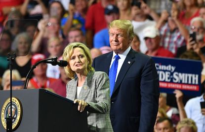 Cindy Hyde-Smith with Donald Trump.