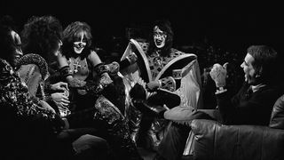 THE TOMORROW SHOW -- Pictured: (l-r) Gene Simmons, Paul Stanley, Peter Criss, Ace Frehley of KISS, host Tom Snyder -