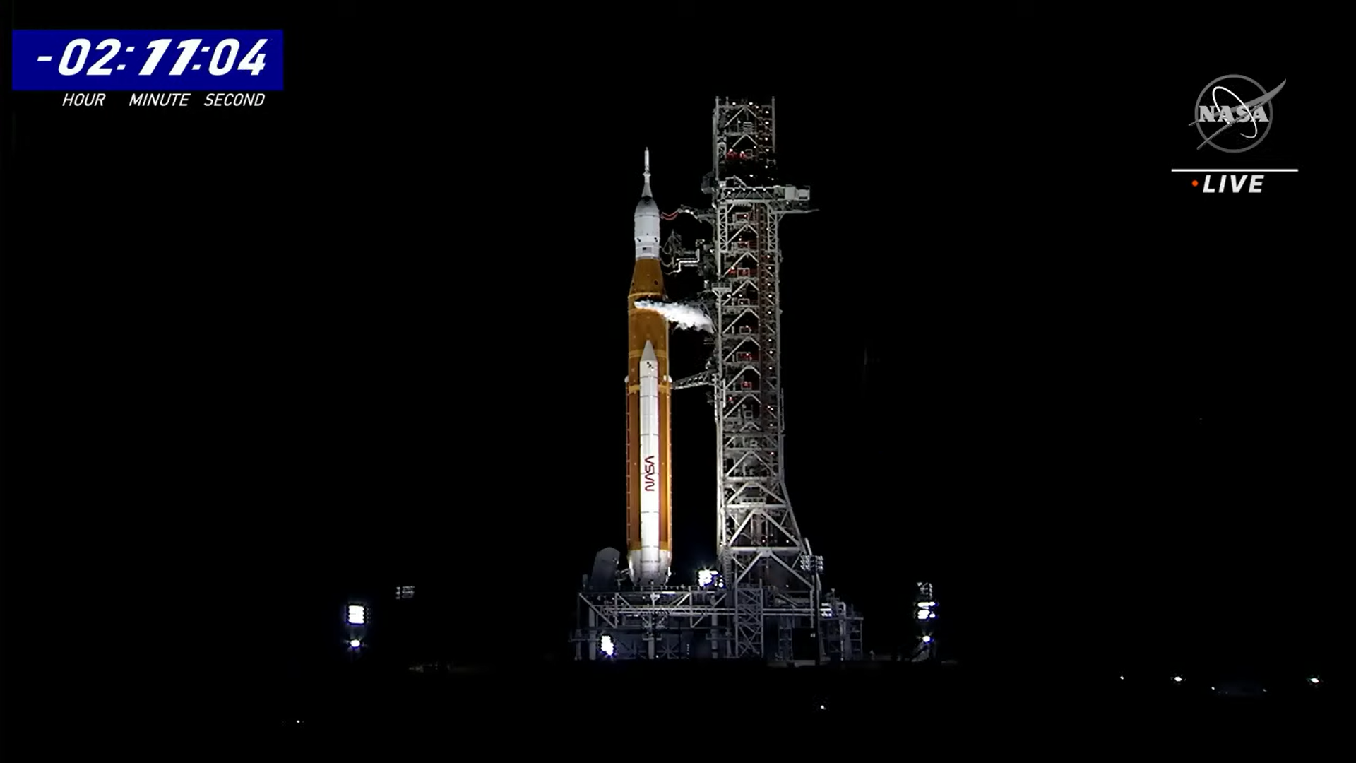 A still from a live video feed of the Artemis 1 rocket on the launch pad during countdown.