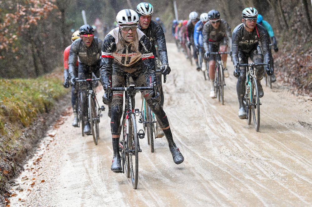 Tom Dumoulin (Team Sunweb) puts a foot down on a muddy descent at Strade Bianche
