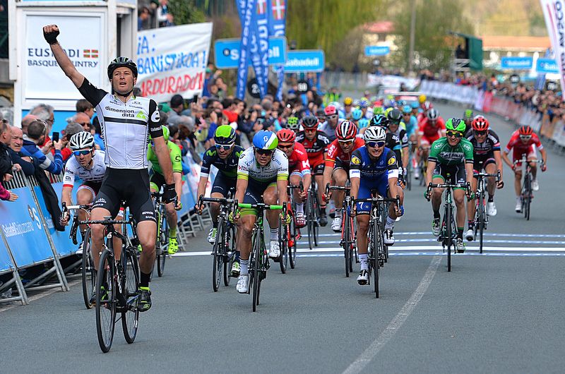 Steve Cummings celebrates as Simon Gerrans (Orica-GreenEdge) wins the bunch sprint for second