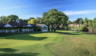 Woking Golf Club and clubhouse pictured