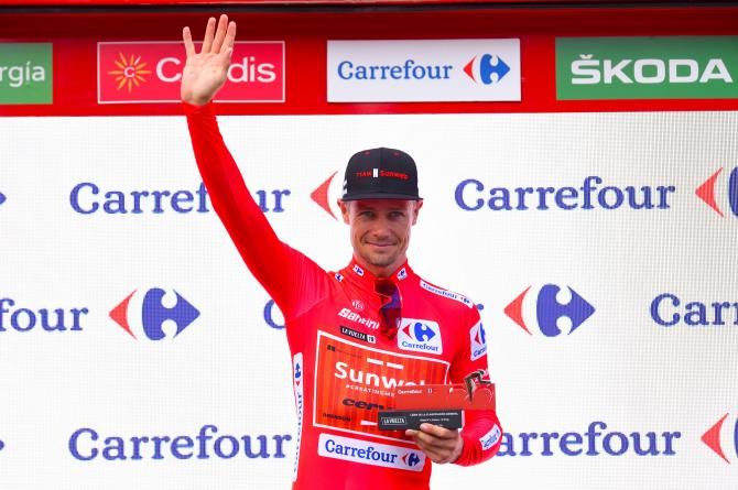 Nicolas Roche pulls on the red jersey again