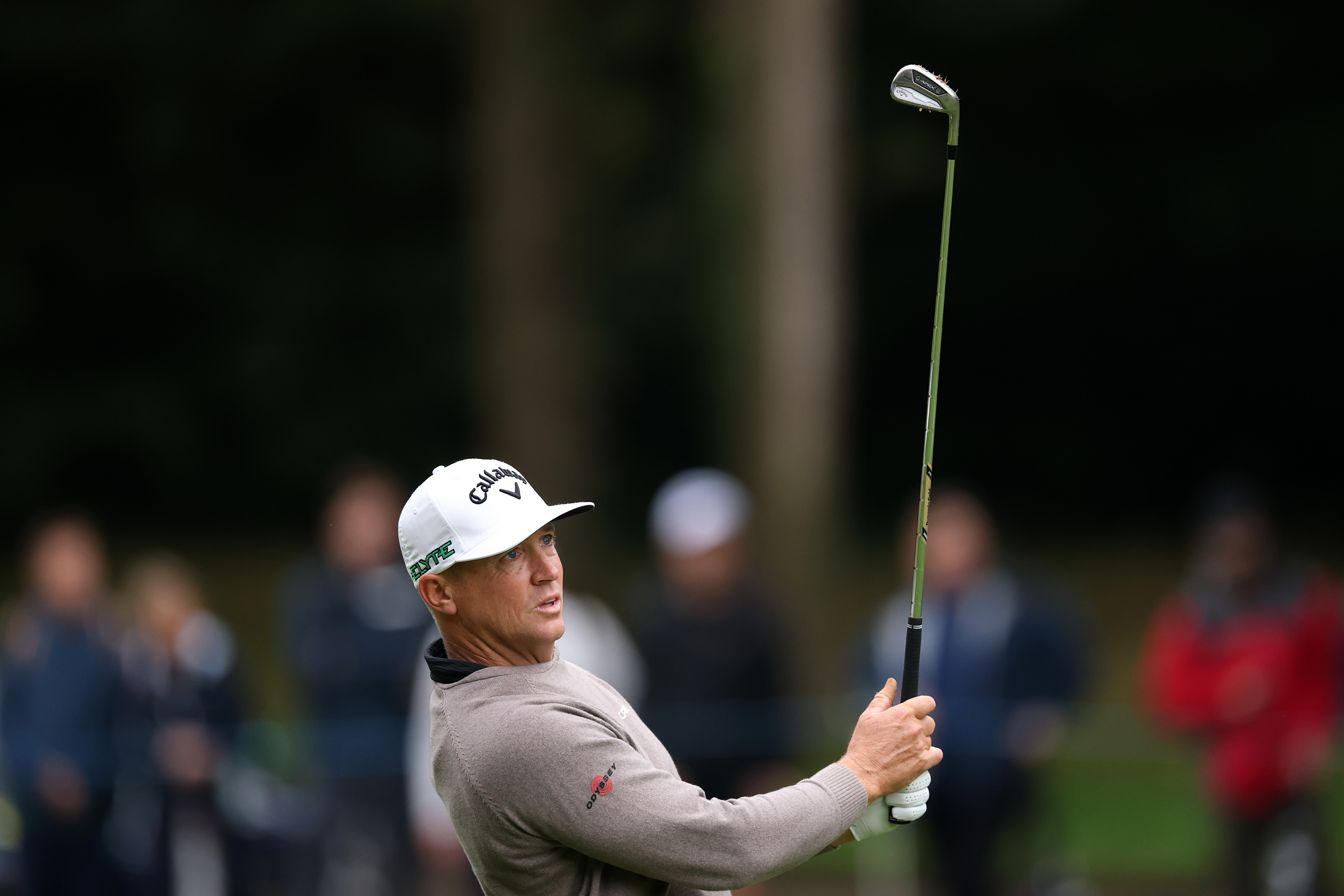 Alex Noren watches an iron shot