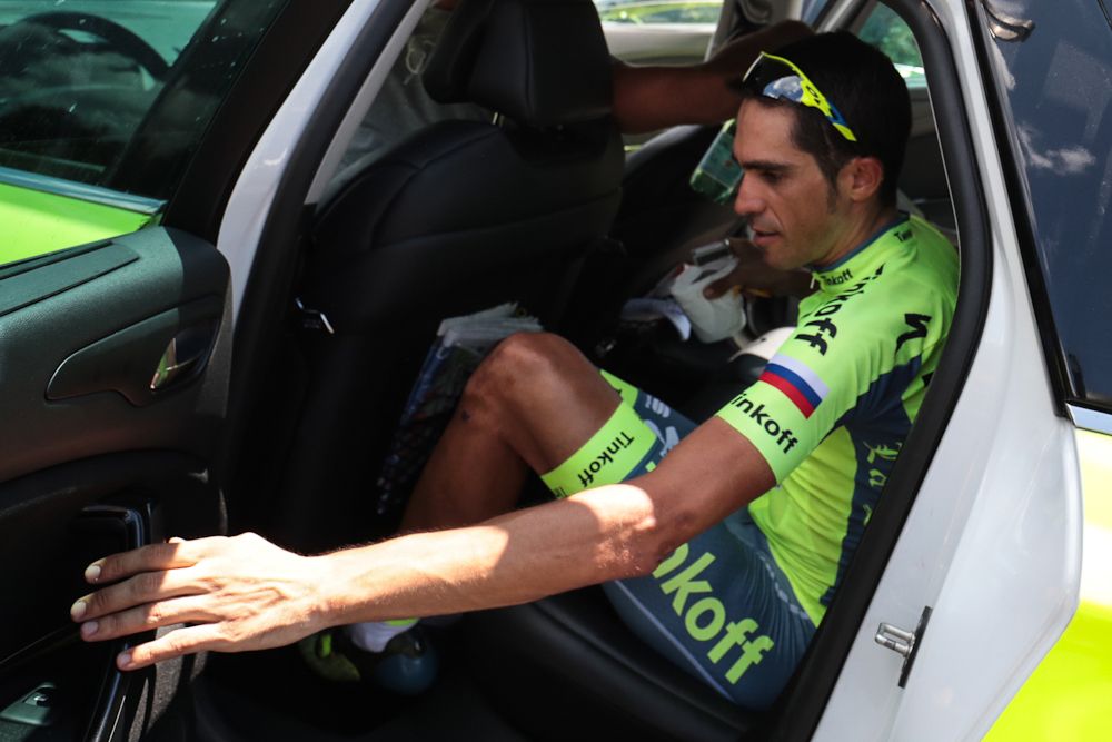 Alberto Contador climbs into the team car during stage 9, abandoning the 2016 Tour de France