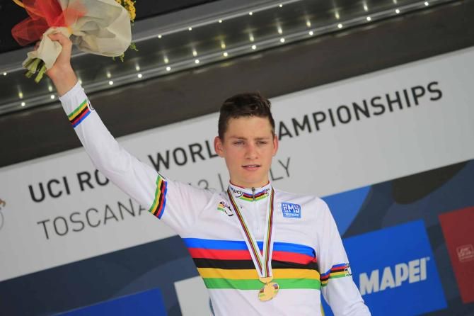 Mathieu van der Poel (Netherlands) claims a road race rainbow jersey to go with his cyclo-cross world title.