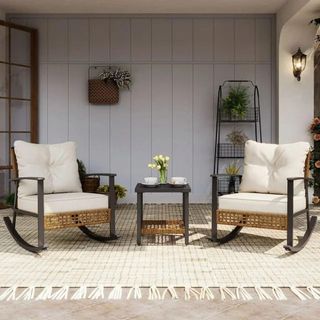 Two outdoor rocking chairs and a small side table