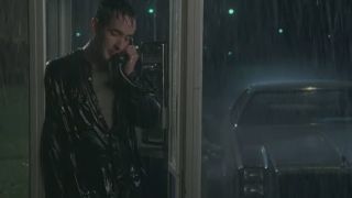 John Cusack in a phone booth in the pouring rain in Say Anything...