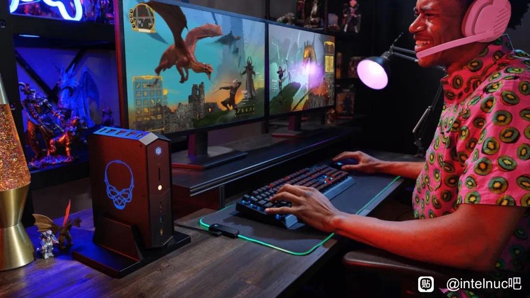 A man wearing a colorful shirt and a headset plays a generic fantasy game on an Intel NUC 12 mini PC connected to a dual-screen setup.