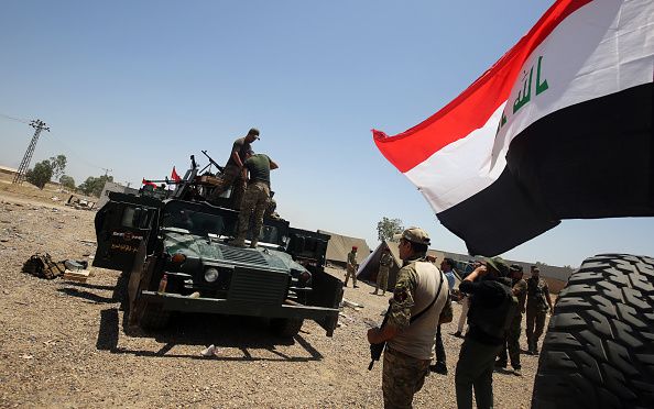 Iraqi forces prepare before an assault against ISIS in Fallujah.