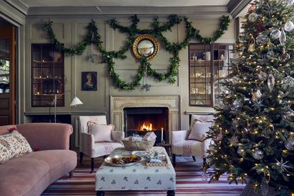 Natural Christmas garlands in a light green living room