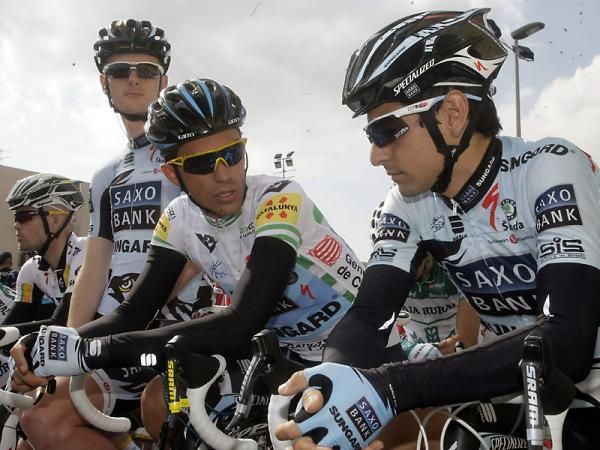 Race leader Alberto Contador and teammate Daniel Navarro await the start of stage 5.