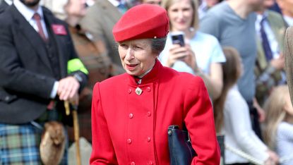 Princess Anne, wearing a red coat, attends The Braemar Gathering 2023 