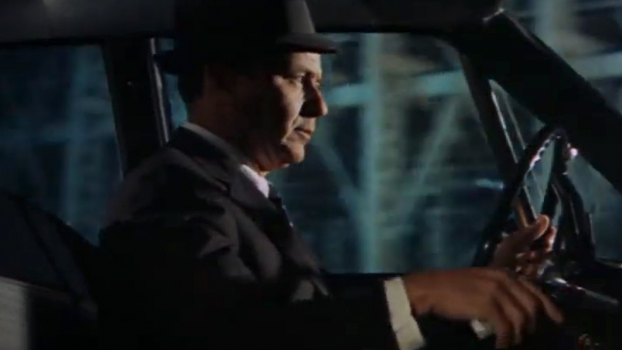 Frank Sinatra driving a car in The Detective
