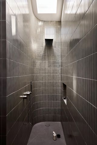 Upstairs shower with grey tiles , Nido II House, Melbourne Australia by Angelucci Architects
