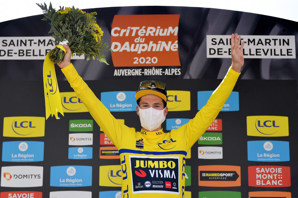 SAINT MARTIN DE BELLEVILLE FRANCE AUGUST 14 Podium Primoz Roglic of Slovenia and Team Jumbo Visma Yellow Leader Jersey Celebration Flowers Covid safety measures during the 72nd Criterium du Dauphine 2020 Stage 3 a 157km stage from Corenc to Saint Martin de Belleville 1419m dauphine Dauphin on August 14 2020 in Saint Martin de Belleville France Photo by Justin SetterfieldGetty Images