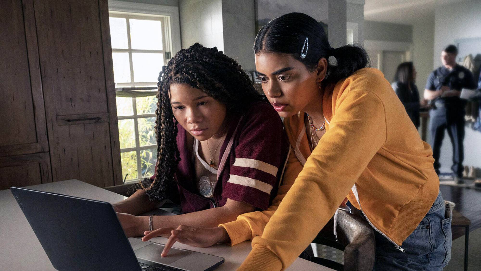 Storm Reid as June and Megan Suri as Veena in "Missing" film (2023)