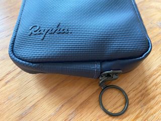 Bottom zip ring pull of the Rapha Rainproof Essentials Case – Large