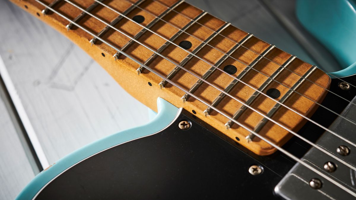 A tech explains how to change your electric guitar strings like a pro: "The method we're demonstrating here is the quickest, best for stability and easiest to de-string when it’s time"