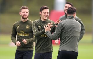 Mesut Ozil (centre) is in the squad for Thursday's match