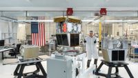 Reflect Orbital co-founder and CEO Ben Nowack with the company's Earendil-1 demonstration satellite, which is slated to launch to Earth orbit sometime in 2026.