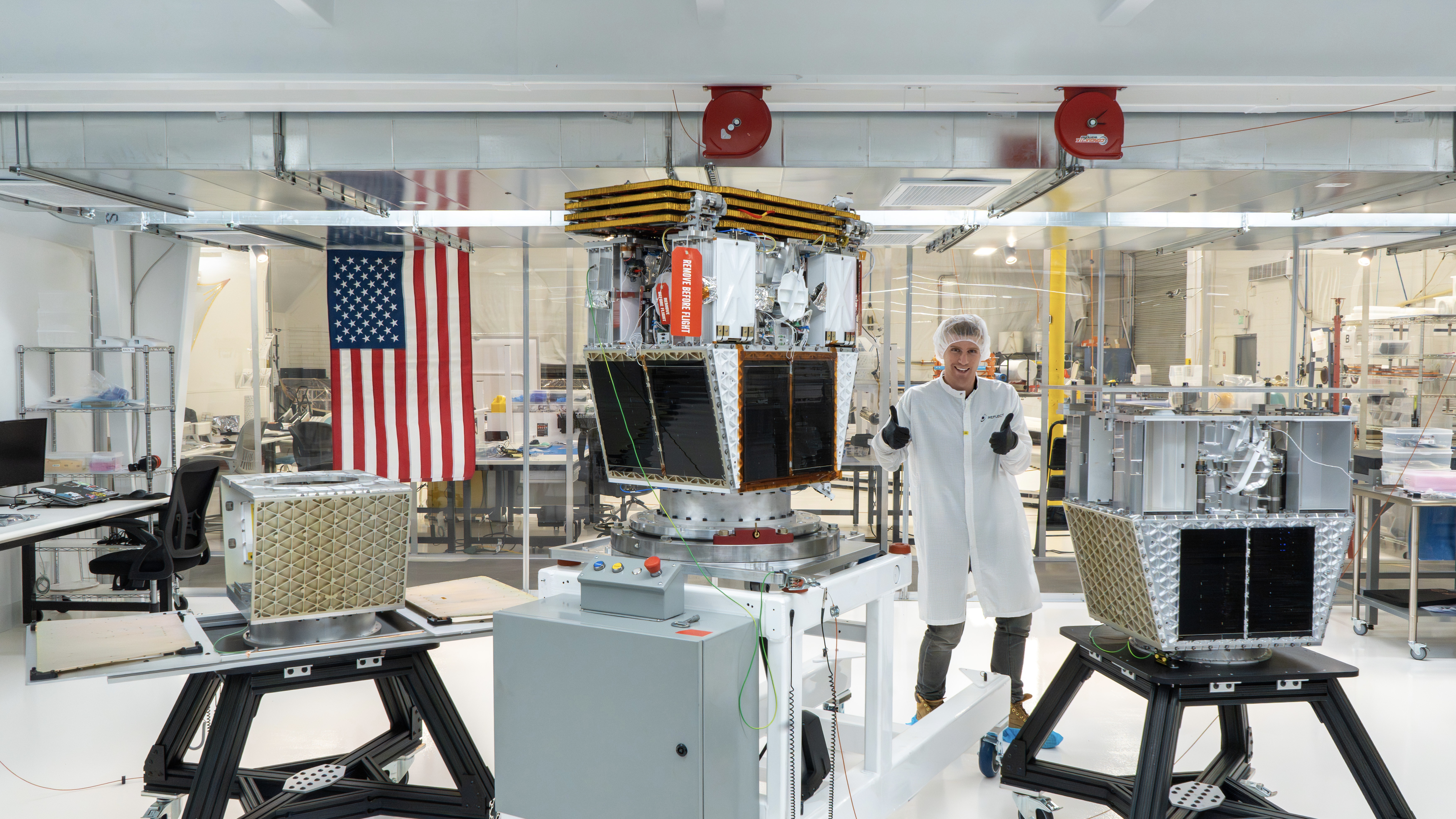 Reflect Orbital co-founder and CEO Ben Nowack with the company's Earendil-1 demonstration satellite, which is slated to launch to Earth orbit sometime in 2026.