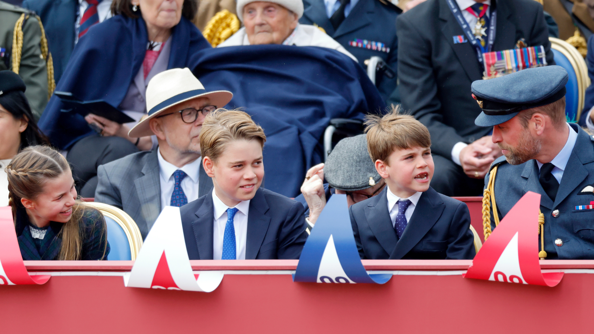 Princess Charlotte, Prince George and Prince Louis with Prince William at VE Day