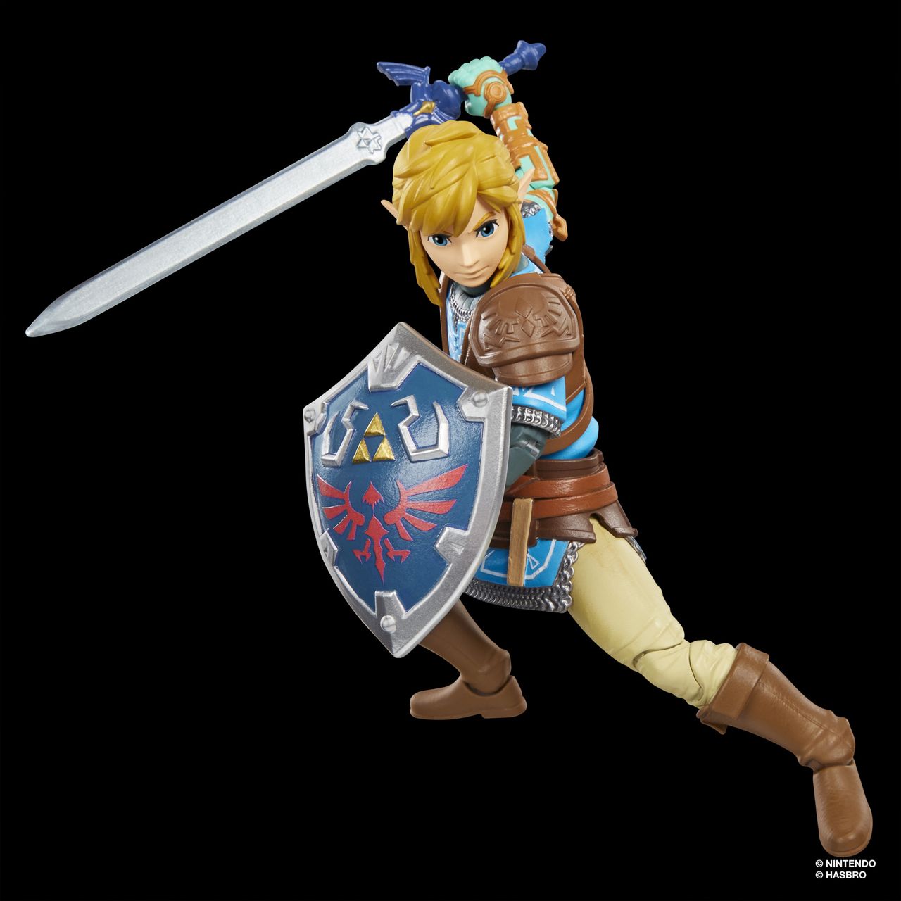 An action figure of Link from Tears of the Kingdom stands against a dark background