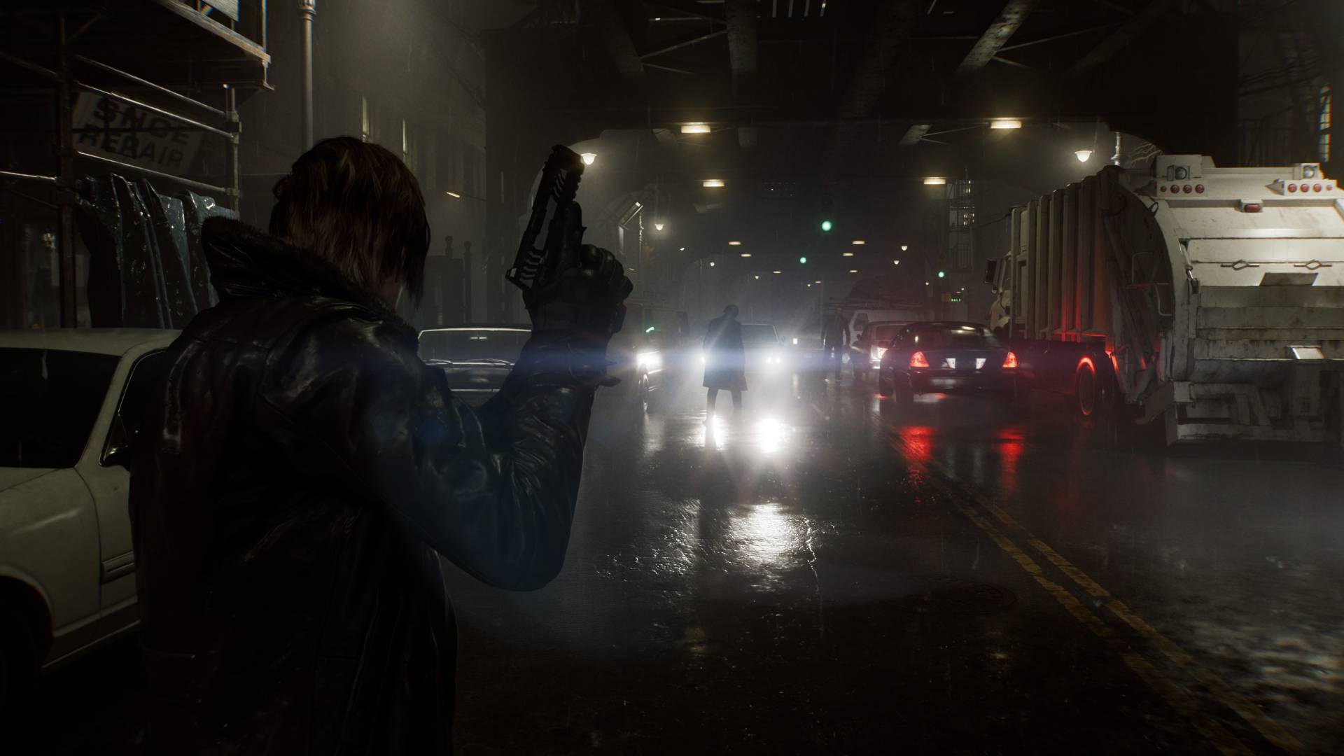 Resident Evil Requiem screenshot featuring Leon holding gun with bright car headlights in backdrop and silhouette of infected civilian in front.