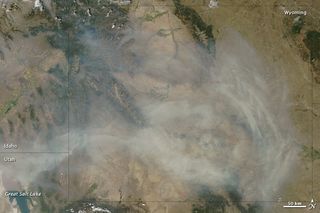 Smoke billowing over Wyoming, from fires in Idaho as well as California, Oregon and Nevada, on Aug. 14.