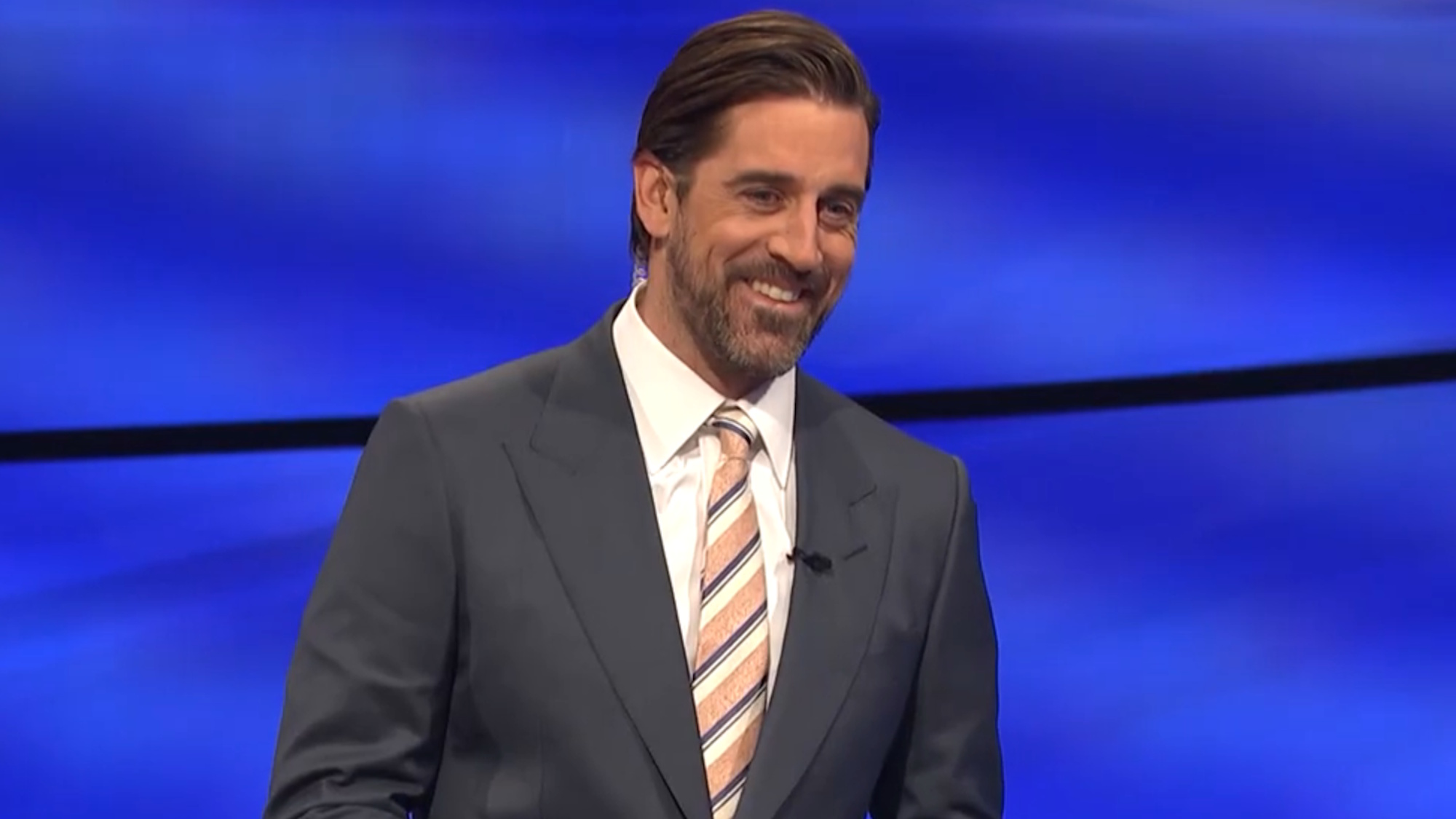 Aaron Rodgers serves as a guest host on Jeopardy! in 2021.