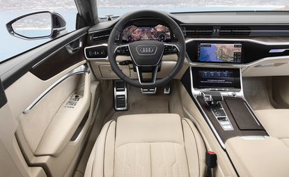 The driver view inside the Audi A7 Sportback with light-toned interiors