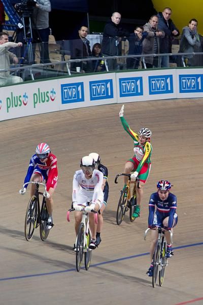 Women's keirin winner Olga Panarina (Belarus) salutes the crowd on her cool down laps.