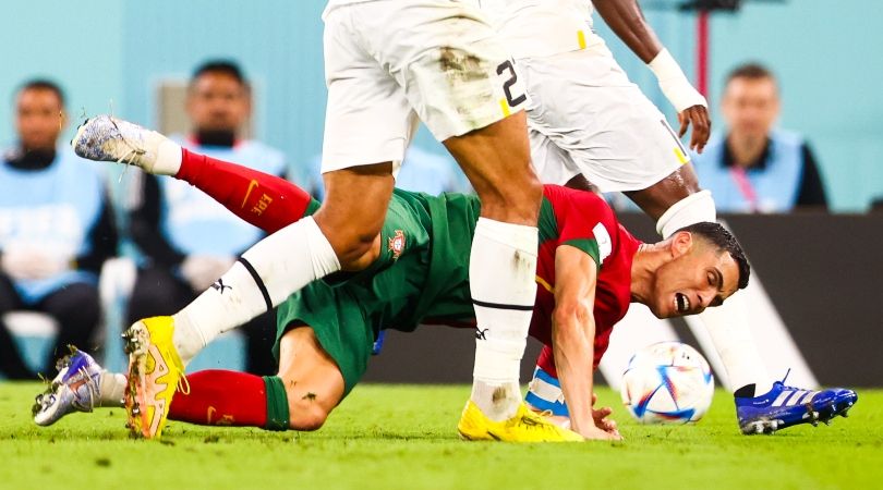 Cristiano Ronaldo goes down during Portugal&#039;s 3-2 win over Ghana at the World Cup in Qatar.