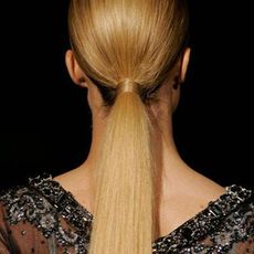 Model with long blonde ponytail
