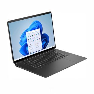 An open and powered on laptop against a white background shown at an angle