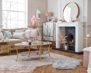 Pink, white and gold living room with mirror ideas above mantelpiece