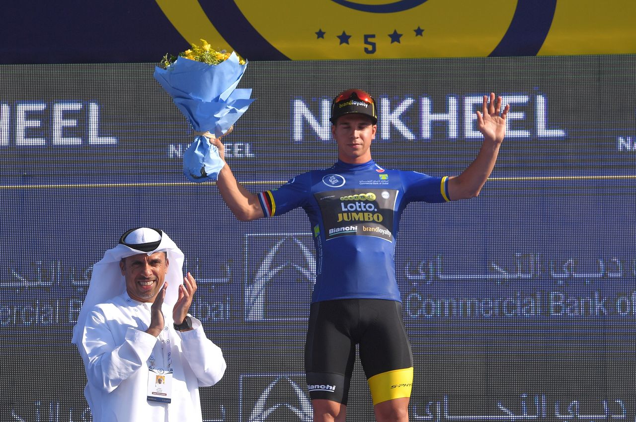 Dylan Groenewegen in the jersey for race leader