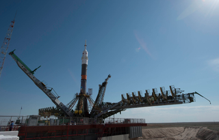 TMA-13M Soyuz Being Raised