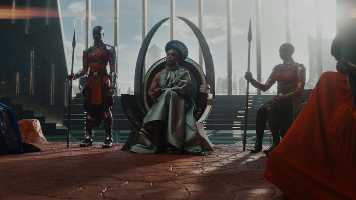 Angela Bassett&#039;s Ramonda sitting in Wakandan throne room in Black Panther: Wakanda Forever