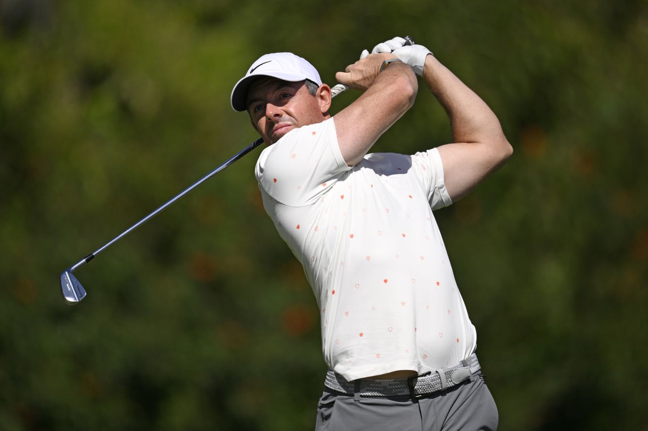 Rory McIlroy hits an iron shot