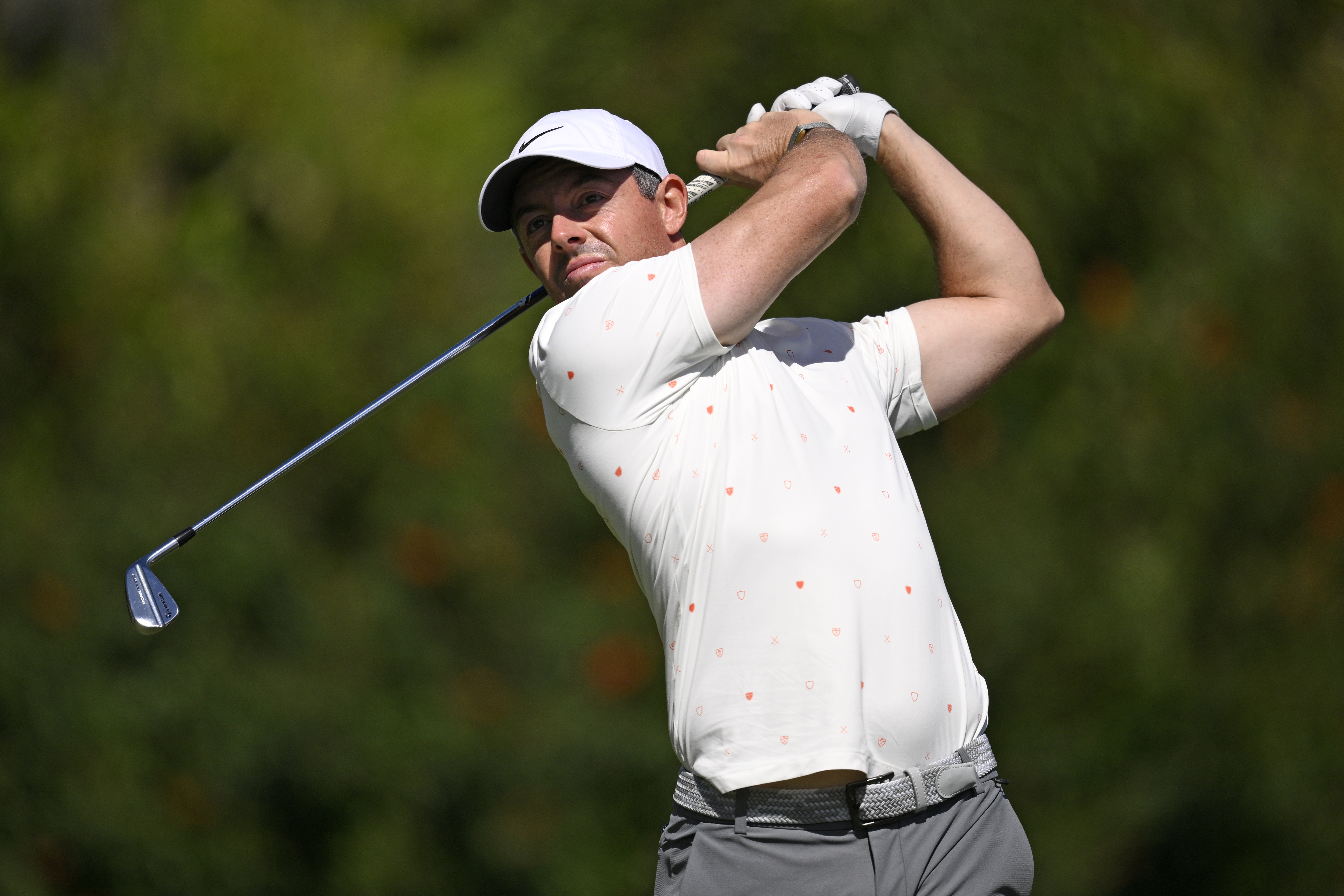 Rory McIlroy hits an iron shot