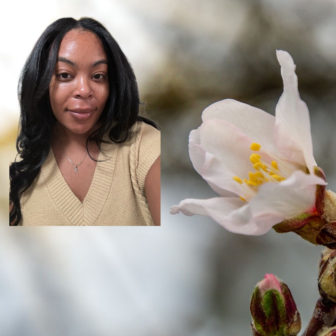 A picture of Ariel Baker next to an almond plant, with almond beauty products around the plant